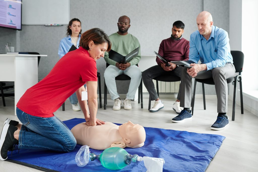 female-instructor-showing-cpr-on-training-doll-2023-11-27-04-59-29-utc-1024x683